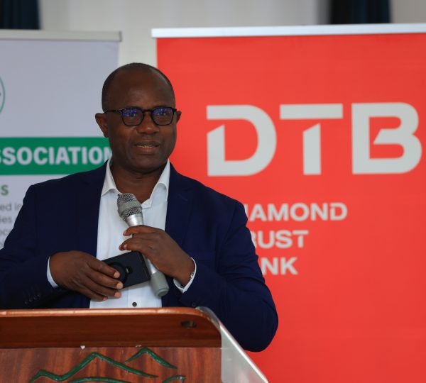 The Guest of Honour, Minister of Agriculture Hon. Fred Bwino Kyakulaga, addressing the audience and attendees at the event.
