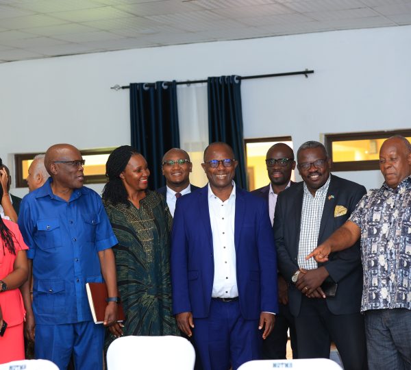 Hon. Fred Bwino Kyakulaga in a group photo with the UTA Secretariat and our valued strategic partners at the event.