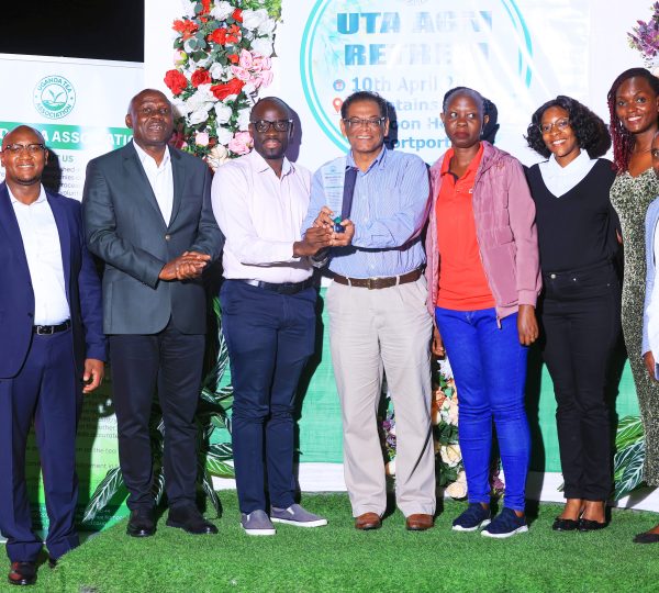 Celebrating shared milestones: McLeod Russel (U) Ltd  alongside our valued strategic partners, Diamond Trust Bank (DTB), holding the award at the event.